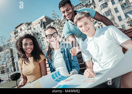 Happy smart man pointing at the whatman paper Stock Photo
