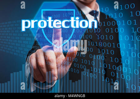 Virtual multimedia display. A man in a suit and tie clicks his index finger on the virtual screen Stock Photo