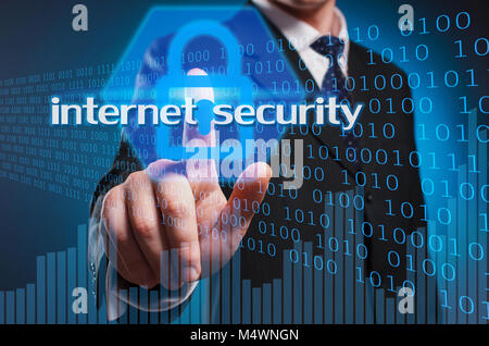 Virtual multimedia display. A man in a suit and tie clicks his index finger on the virtual screen Stock Photo