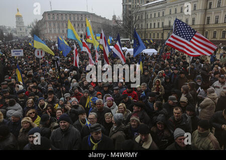 Kyiv, Ukraine. 18th Feb, 2018. Few thousands of protesters and supporters of the former Georgian president and ex-Odessa Governor Mikheil Saakashvili march downtown Kyiv demanding Ukrainian parliament to pass a presidential impeachment bill in Kyiv, Ukraine, Feb. 18, 2018. Mikheil Saakashvili, ex-Georgian President and leader of the 'Movement of New Forces' Ukrainian party was detained in a Kiev and was deported to the Poland on 12 February 2018. Credit: Sergii Kharchenko/ZUMA Wire/Alamy Live News Stock Photo