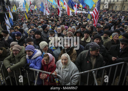 Kyiv, Ukraine. 18th Feb, 2018. Few thousands of protesters and supporters of the former Georgian president and ex-Odessa Governor Mikheil Saakashvili march downtown Kyiv demanding Ukrainian parliament to pass a presidential impeachment bill in Kyiv, Ukraine, Feb. 18, 2018. Mikheil Saakashvili, ex-Georgian President and leader of the 'Movement of New Forces' Ukrainian party was detained in a Kiev and was deported to the Poland on 12 February 2018. Credit: Sergii Kharchenko/ZUMA Wire/Alamy Live News Stock Photo