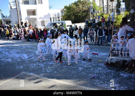 Paphos, Cyprus. 18th Feb, 2018. Paphos Carnival 2018 is a traditional, annual street carnival  - Sunday 18th February. This was originally scheduled to be held on Saturday, but heavy rain postponed it for a day, and it was moved to the 18th on the Mayor's orders. Most of the floats were staffed by local businesses and organisations. Stock Photo