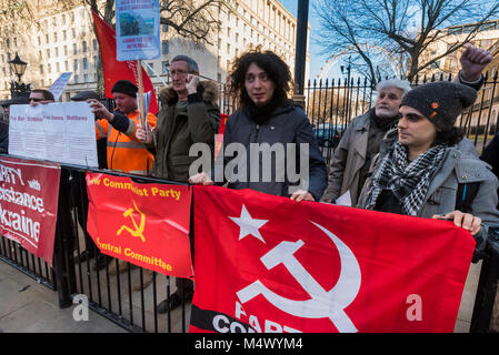 February 17, 2018 - London, UK. 17th February 2018. Campaigners at Downing St condemn the delivery of $350 millon of US weapons to Kiev in preparation for a war against the self-declared Donbass republics of Donetsk and Lugansk which it says are ''occupation administrations'' of the Russian Federation. The Ukrainian government in Kiev has refused to implement the 2015 Minsk II agreement negotiated by Germany, Russia, Ukraine and France with the Donbass republics recognised as participants. They say that the 2014 Maidan coup came one week after a visit to Kiev by CIA boss John Brennan and was U Stock Photo