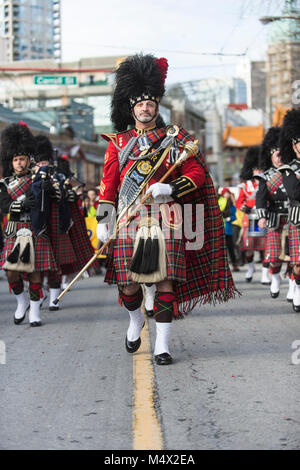 Vancouver, Canada. 18 February 2018. Vancouver Police Drum Major David Caven.  Chinese Lunar New Year Parade Chinatown. Credit: GerryRousseau/Alamy Live News Stock Photo