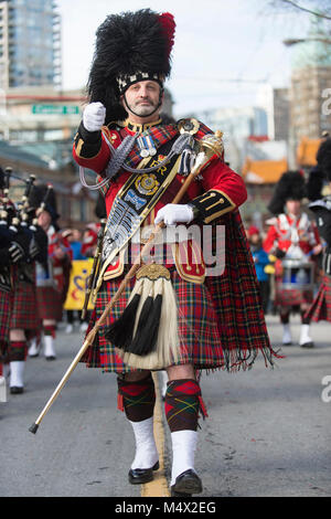 Vancouver, Canada. 18 February 2018. Vancouver Police Drum Major David Caven. Chinese Lunar New Year Parade Chinatown. Credit: GerryRousseau/Alamy Live News Stock Photo