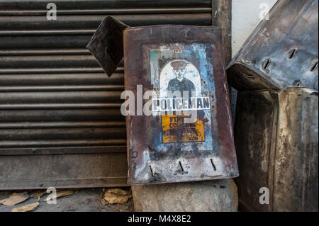 A vintage can of Policeman brand, now used as a fire pit. Leh Ladakh, Jammu and Kashmir, India. Stock Photo