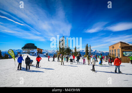 Skiers milling around at summit of Keystone Ski Resort in Colorado. Stock Photo