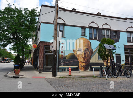 The American Gothic mural, found on East Lincoln Street in the Short North Arts District of Columbus, Ohio, is one of the most well known paintings. Stock Photo
