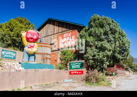 A 13-foot-tall retro apple-headed lad designed by its owners, who are artists and apple fans. Stock Photo