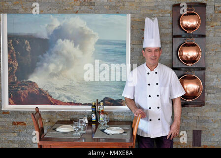 Chef Gilberto Furtado in cooking outfit in his restaurant 'Gigi' in Sagres Stock Photo