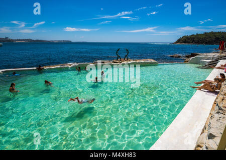 Cabbage Tree bay rock pool, Manly on a hot summer day with blue sky, Sydney, Australia Stock Photo