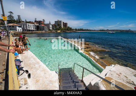 Cabbage Tree bay rock pool, Manly on a hot summer day with blue sky, Sydney, Australia Stock Photo