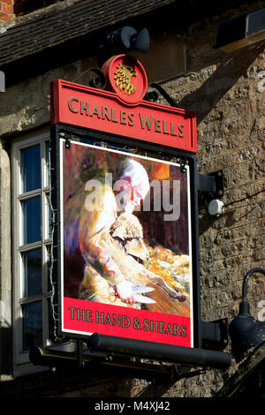 The Hand and Shears pub sign, Church Hanborough, Oxfordshire, England, UK Stock Photo