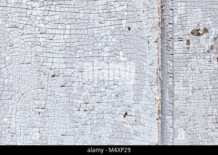 cracked old paint texture. fragment of an old wooden door Stock Photo