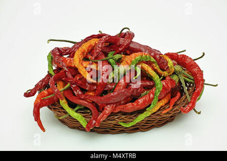 little basket with many bell peppers Stock Photo