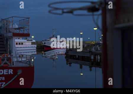 Ships in the evening in the Sassnitz harbor Stock Photo