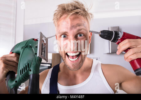 Cropped View Of Workman With Electric Drill Free Stock Photo and Image  482674902