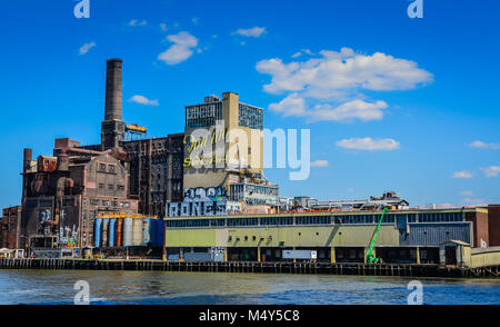 The Domino Sugar Refinery is a former refinery in the neighborhood of Williamsburg in Brooklyn, New York City. Stock Photo