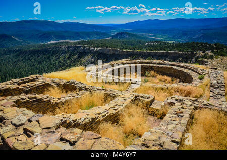 Ancient ruins of Great Kiva at Chimney Rock National Monument in San Juan National Forest in southwestern Colorado with far off view of Chaco Canyon. Stock Photo