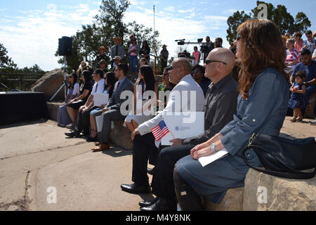 NPS Centennial Grand Canyon Naturalization Ceremony  U.S. Citizenship and Immigration Services (USCIS) teamed with Grand Canyon National Park and the National Park Service (NPS) to welcome 15 new United States citizens representing 12 countries. The ceremony took place August 25th, 2016, the National Park Service's 100th birthday, at 10 am at Mather Point Amphitheater. In honor of the NPS Centennial, USCIS has partnered with the NPS to hold more than 100 naturalization ceremonies on national park sites during 2016. Stock Photo