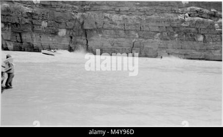 OTIS MARSTON RIVER EXPEDITION WITH FIVE MOTORBOATS PREPARING TO LEAVE FOR TRIP THROUGH GRAND CANYON TO LAKE MEAD, FROM LEE'S FERRY WHERE PHOTO WAS TAKEN.  PHOTOGRAPHER H.C. BRYANT. CIRCA 1951.     Grand Canyon Nat Park Historic River Photo. Stock Photo