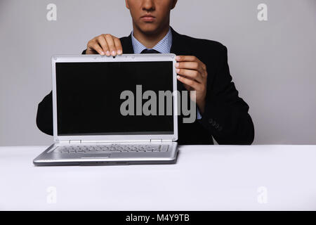 closeup.businessman shows a stylish notebook Stock Photo