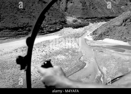 DELTA AT THE CONFLUENCE OF THE LITTLE COLORADO WITH THE COLORADO RIVER AS SEEN FROM INSIDE HELICOPTER COCKPIT. CIRCA 1957.    Grand Canyon Nat Park Historic River Photo. Stock Photo