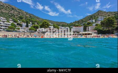 Mediterranean beach in summer in Spain on the Costa Brava, Catalonia, Canyelles Petites, Roses, Girona, seen from sea surface Stock Photo