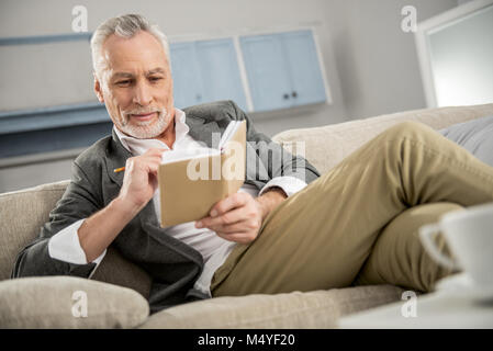 Handsome bearded man having break Stock Photo