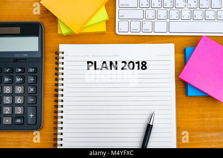 Plan 2018 Notebook business team meeting  with an Plan 2018 Stock Photo