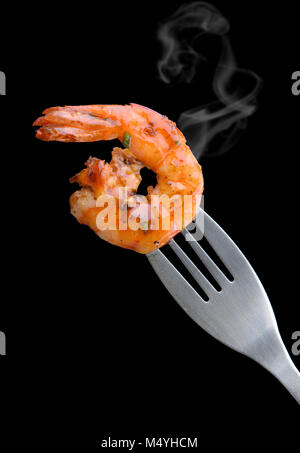 Grill Shrimp BBQ style mixed spicy ,ingredient set in black backgrount with smoke in studio lighting. Stock Photo