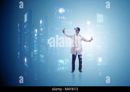 Doctor in telemedicine concept with virtual reality glasses Stock Photo