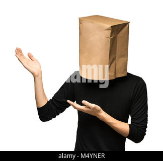 young man covering his head using a paper bag. Stock Photo
