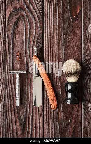 Vintage barber shop tools on wooden background Stock Photo