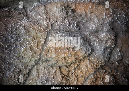 Rough Granite Stone Rock Background Texture,Closeup of a sedimentary mountain limestone rocks texture. Stock Photo