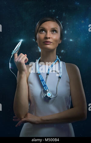 People of the future. Pretty woman against cosmic background Stock Photo