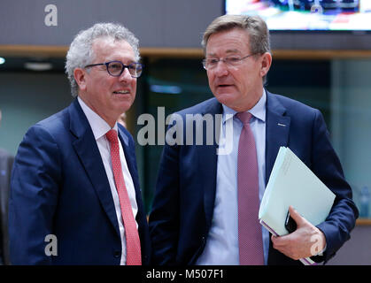 Brussels. 19th Feb, 2018. Luxembourg's Finance Minister Pierre Gramegna (L) and Belgian Finance Minister Johan Van Overtveldt talk at the start of a Eurogroup Finance Ministers' meeting at the EU Council in Brussels, Belgium, Feb.19, 2018. Credit: Ye Pingfan/Xinhua/Alamy Live News Stock Photo