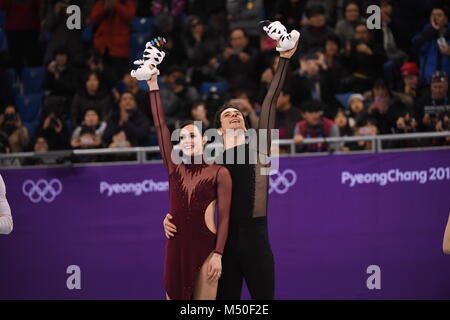 Pyeongchang, South Korea. 20th Feb, 2018. Tessa Virtue (L) and Scott Moir of Canada celebrate after the ice dance free dance of figure skating at the 2018 PyeongChang Winter Olympic Games, in Gangneung Ice Arena, South Korea, on Feb. 20, 2018. Tessa Virtue and Scott Moir won the gold medal of ice dance event with 206.07 points in total. Credit: Ju Huanzong/Xinhua/Alamy Live News Stock Photo