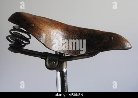 vintage leather bike saddle Stock Photo