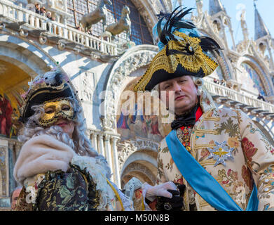 Masked revellers in St Mark's Square at the Venice Carnival in Italy ...