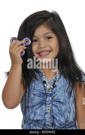 Girl with fidget spinner Stock Photo