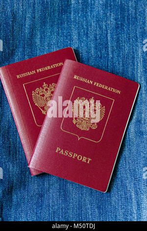 two Russian passport to travel on a blue background. Stock Photo