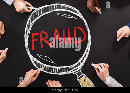 People Drawing Fraud Investigation And Audit Concept Stock Photo