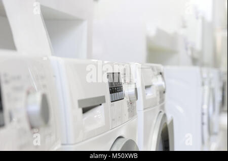 washing machines in appliance store Stock Photo