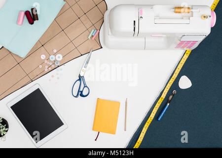 digital tablet and tailoring items Stock Photo