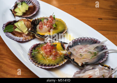 fresh scallops new peruvian cuisine style Stock Photo