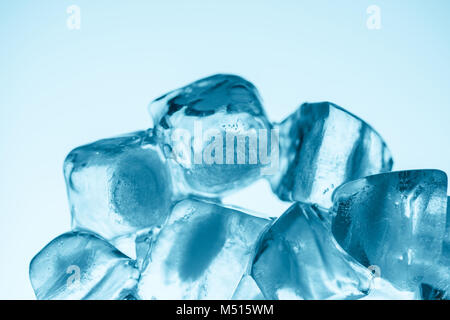 close up of melting ice cubes, isolated on white Stock Photo