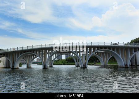 Arch bridge in xiamen garden expo, china Stock Photo