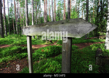 old empty wooden pointer in the forest Stock Photo - Alamy