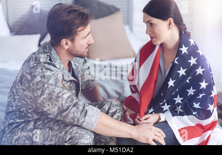 Farewell of married couple before husband leaving on military service Stock Photo